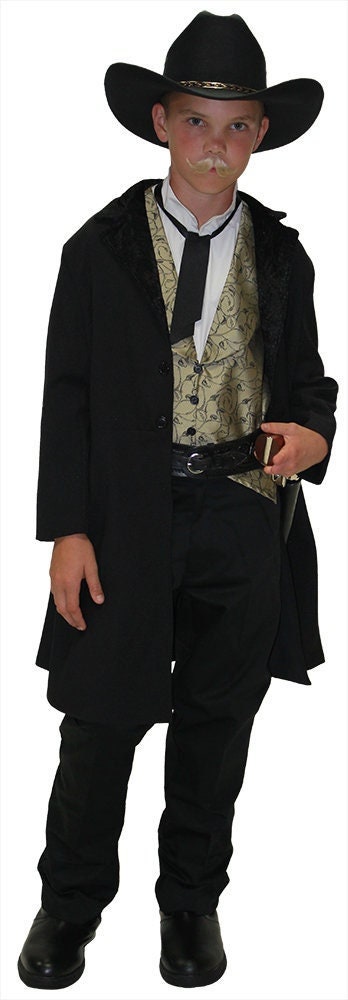 Children's Doc Holliday costume featuring a black Victorian frock coat, brocade vest with an attached wing-tip shirt front, and a classic Western-style tie. Perfect for Old West reenactments, theatrical performances, and cowboy-themed events.